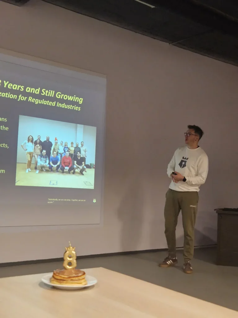 A team member presenting at a HIREQUARTERS anniversary gathering